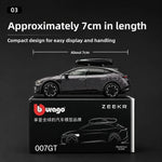 A dark gray metallic toy car model with a roof box, displayed on top of its black branded box. White text above reads 'Approximately 7cm in length' with a measurement line indicating about 7cm, on a dark background.
