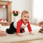 Baby boy wearing a cute heart-themed Valentine's Day outfit