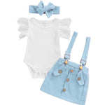 Baby outfit set with white romper, blue suspenders, and headband on a white background