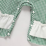 Baby girl bodysuit with green plaid and four-leaf clover allover print
